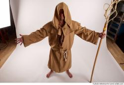 JOEL_ADAMSON STANDING POSE WITH A MAGIC STICK